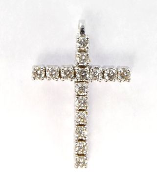a diamond cross pendant on a white background