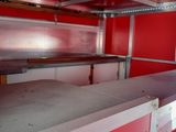 an image of the inside of a firetruck with red walls