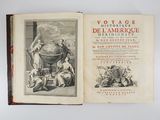 an old book with a picture of a man holding a globe on it