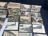 a lot of old postcards on the table