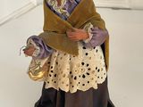 figurine of a woman holding a baby in her arms