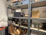 a room with a lot of boxes and boxes on the shelves