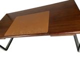 an image of a wooden table with a leather top and metal legs