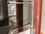 two ovens that are sitting in the kitchen