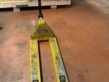 a fork that is sitting on top of a pallet