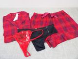 trois sous-vêtements et un haut de soutien-gorge posés sur un lit