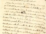 un vieux document écrit posé sur une table