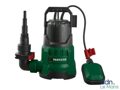 a green and black pump with a hose attached to it