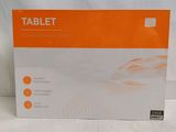 an orange and white box of a tablet on a white surface