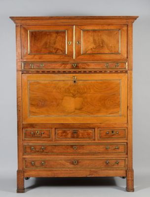 an old wooden cabinet with drawers and drawers on top of it
