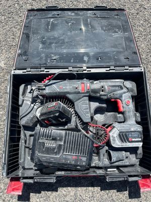 a box with tools in it sitting on the ground