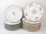 many plates stacked on top of each other on a table