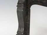 an image of a black marble fireplace surround with a marble top