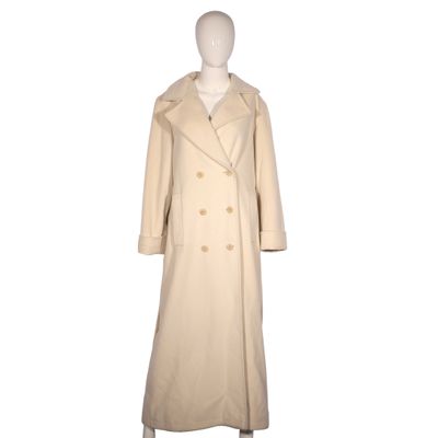 a white mannequin dress and coat on a mannequin mannequin mannequin mannequin mannequin mannequin mannequin mann