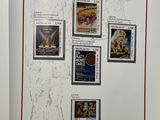 a refrigerator with a bunch of stamps on it