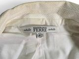 a close up of a white shirt with a label on it