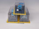 a toy truck that is inside of a clear box