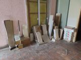 a room with a lot of boxes and boxes on the floor