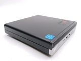 an image of a black laptop computer sitting on top of a white surface