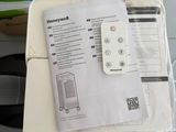 a remote control sitting on top of a white table