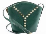 a close up of a green handbag with gold studding