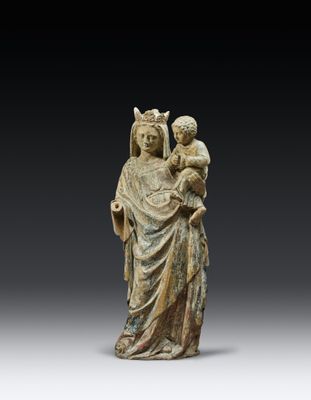 an image of a statue of a woman holding a child