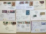 many different types of stamps on the envelopes