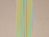 an image of a tall vase with stripes on it