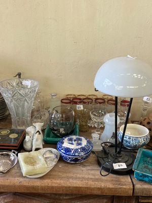 a table with a lot of glass items on it