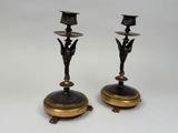 pair of antique brass candlesticks with angels on them