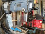 a machine that is sitting on a table in a garage