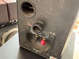 a very old speaker that is sitting on a table