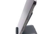 a close up of a cell phone on a stand