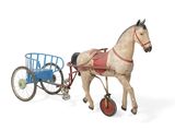 a small toy horse pulling a cart with a horse
