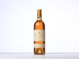 an image of a bottle of wine sitting on top of a table