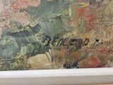 a picture of a painting on a window sill