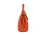 an orange leather handbag on a white background