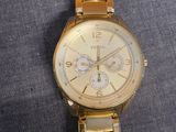 michael korsch watch with gold bracelet and gold dial