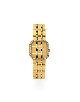 a lady ' s 18k yellow gold and diamond set wristwatch
