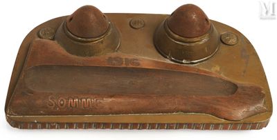 a brown brush and a brown comb on a white surface
