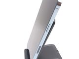 a cell phone that is sitting on top of a stand