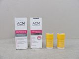 two bottles of acm dernimate and a box of deodorante