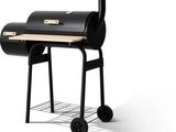 a black bbq grill on wheels with a wooden top