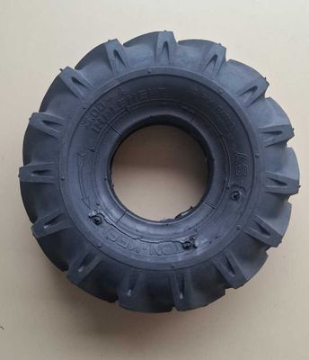 a close up of a tire on a wall