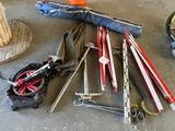 many different types of tools that are sitting on the floor