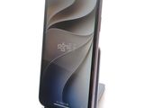 a phone that is sitting on top of a stand