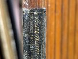 a close up of a wooden door with a sign on it