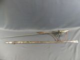 pair of antique silverware spoons with handles and handles