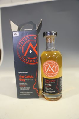 an image of a bottle of whisky next to a box of wine