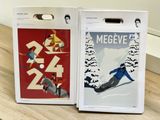 two boxes with a picture of a snowboarder on them